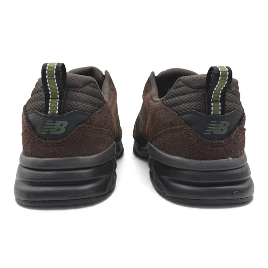 The Shoe Shop 624v5 4E training sneaker in brown suede and synthetic leather, rear view showing pull tab and logo.