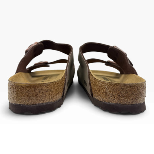 The Shoe Shop Arizona Birkibuc sandals in brown, showing the cork-latex footbed and adjustable metal buckles from rear.