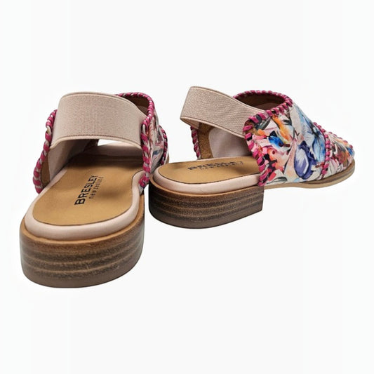 The Shoe Shop Bresley Serenade floral suede sandals with open back, pink stitching, and low wooden block heels.