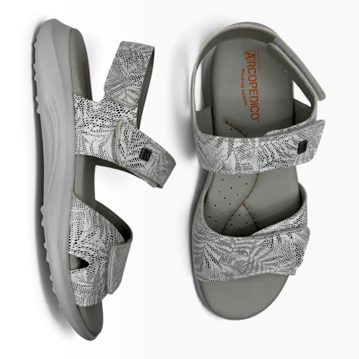The Shoe Shop Corbett walking sandals in grey with a white floral pattern, featuring adjustable velcro straps.