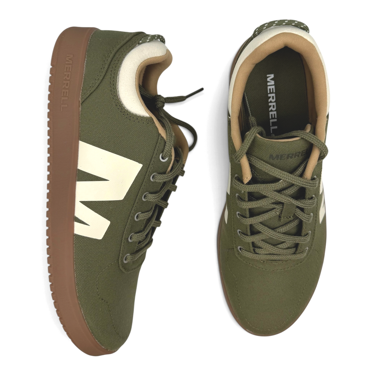 The Shoe Shop Cygnet Canvas mens sneakers in loden green with a brown rubber sole and cream side logo detail.