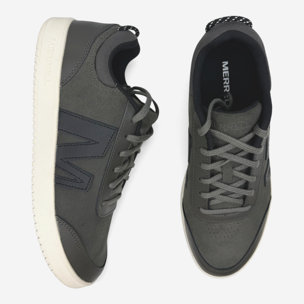 The Shoe Shop Cygnet leather sneakers in dark grey with suede panels, lace-up fastening, and white rubber soles.