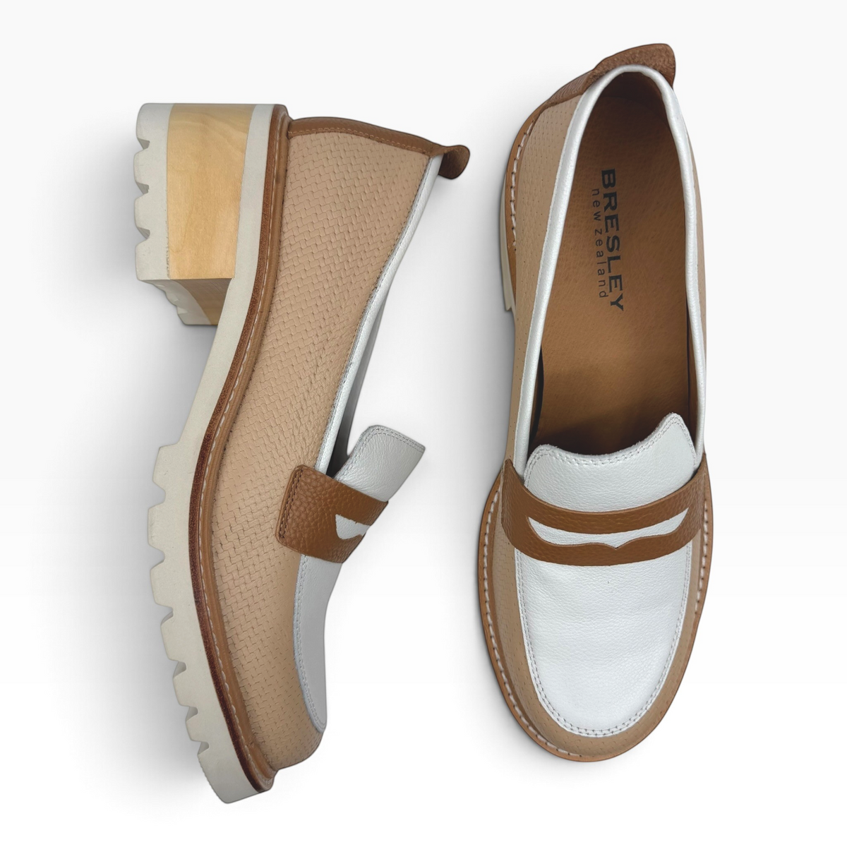 The Shoe Shop Delmira loafer in beige and white with a textured upper, brown trim, and a chunky block heel.