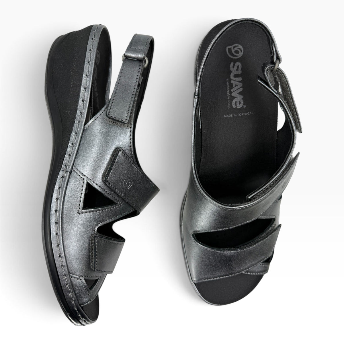 The Shoe Shop Suave Emblin wedge sandals in gunmetal leather with adjustable velcro straps and cushioned footbed.