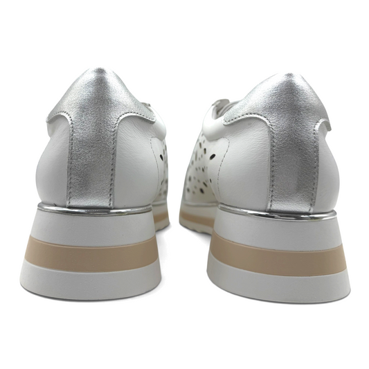 The Shoe Shop Goldie white leather sneakers with metallic silver heel detail and a layered platform sole