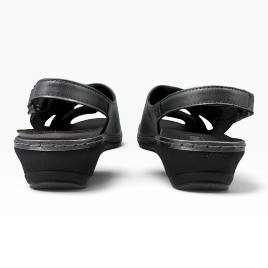 The Shoe Shop Emblin wedge sandals in gunmetal leather with adjustable slingback straps and low wedge heels.