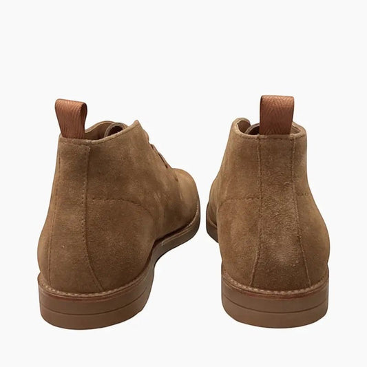 The Shoe Shop Hush Puppies Gibson brown suede ankle boots showing the rear view with pull tabs and flat outsoles.