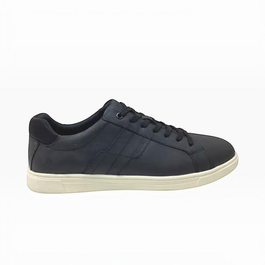 The Shoe Shop Hush Puppies Gravity black leather sneaker with a white rubber outsole and cushioned footbed.