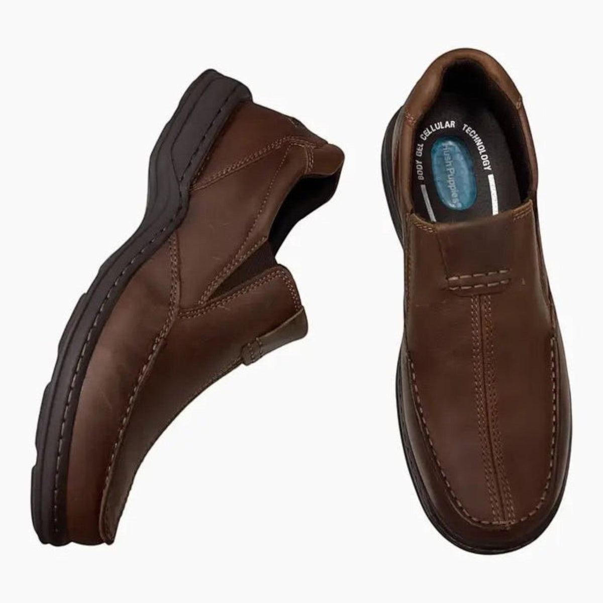 The Shoe Shop Hush Puppies Sawyer II brown leather boat-style slip-on shoes with cushioned orthotic-friendly footbeds.