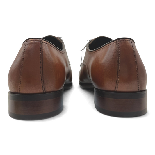 Back view of The Shoe Shop Knock cognac brown leather dress shoes with stacked heels