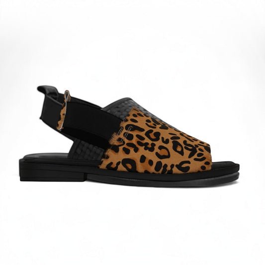 The Shoe Shop Snob slingback sandal featuring a leopard print woven leather upper and a comfortable black flat sole.