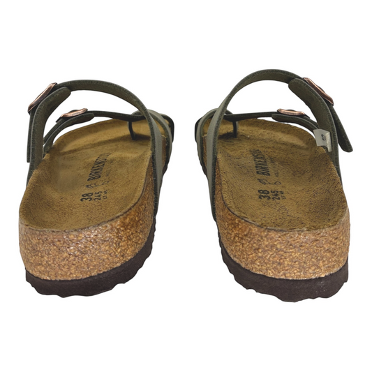 The Shoe Shop Mayari Birkibuc stone sandals with criss-cross straps, cork-latex footbed, and adjustable buckles.