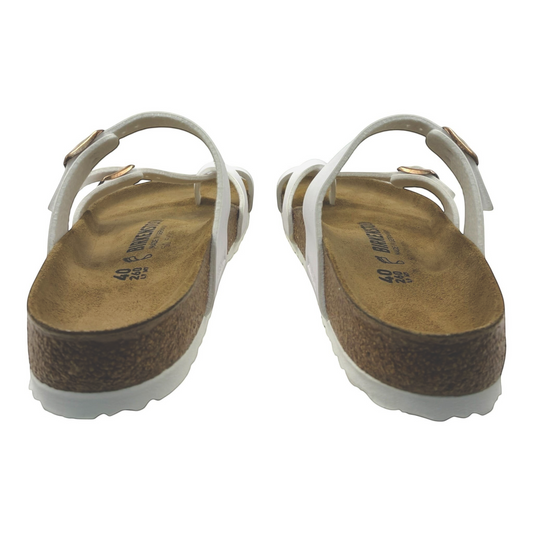 The Shoe Shop Mayari Birko-Flor white sandals with criss-cross toe loop straps and cork-latex footbeds