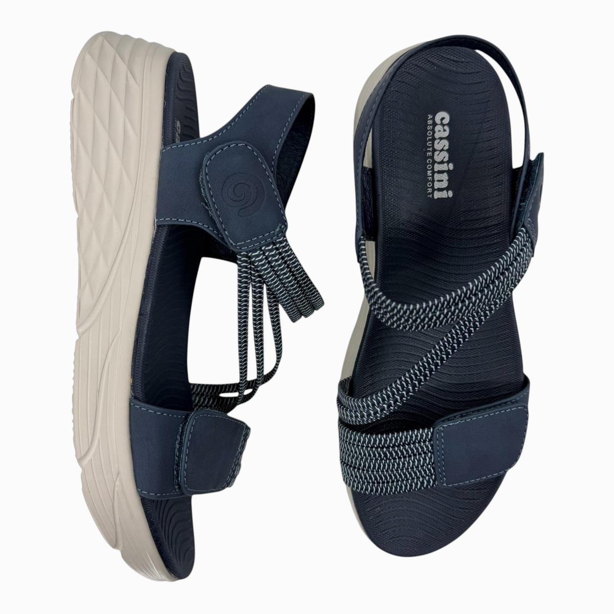 The Shoe Shop Menova navy blue sandals with elastic straps, adjustable Velcro, and a lightweight molded EVA sole.