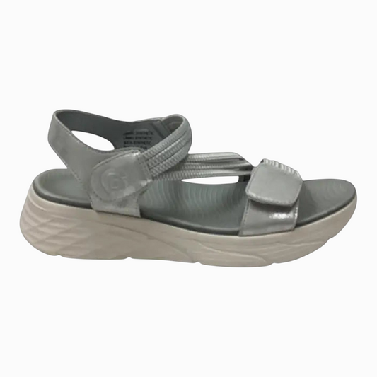 The Shoe Shop Menova silver synthetic sandal with elastic straps, Velcro fasteners, and a lightweight EVA sole.