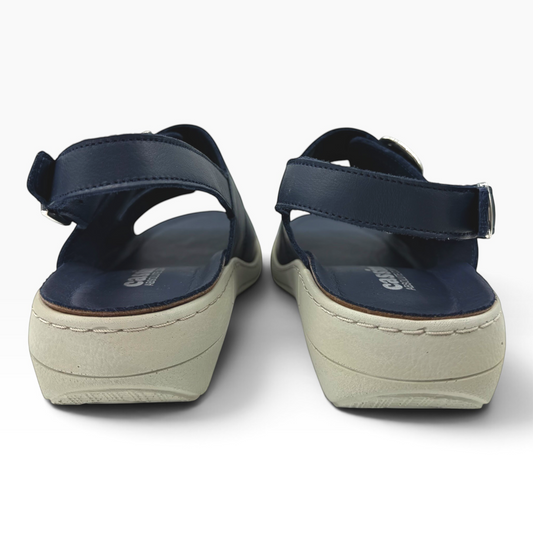 The Shoe Shop Midge navy blue leather sandals with adjustable ankle straps and supportive beige platform soles