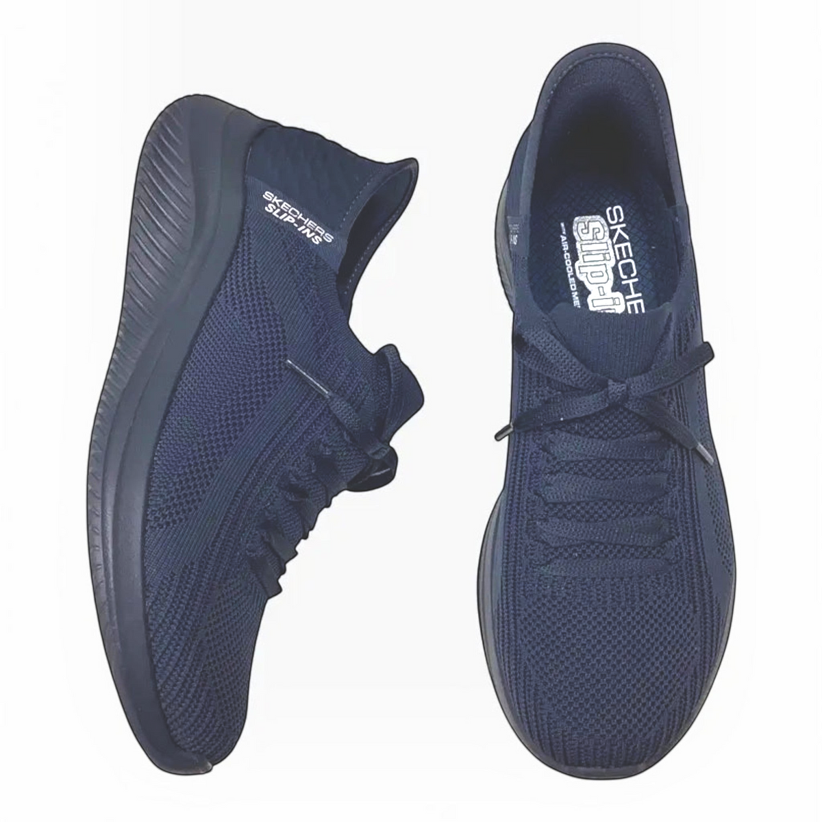 The Shoe Shop Skechers Ultra Flex 3.0 navy blue knit slip-in sneakers with cushioned memory foam insoles.