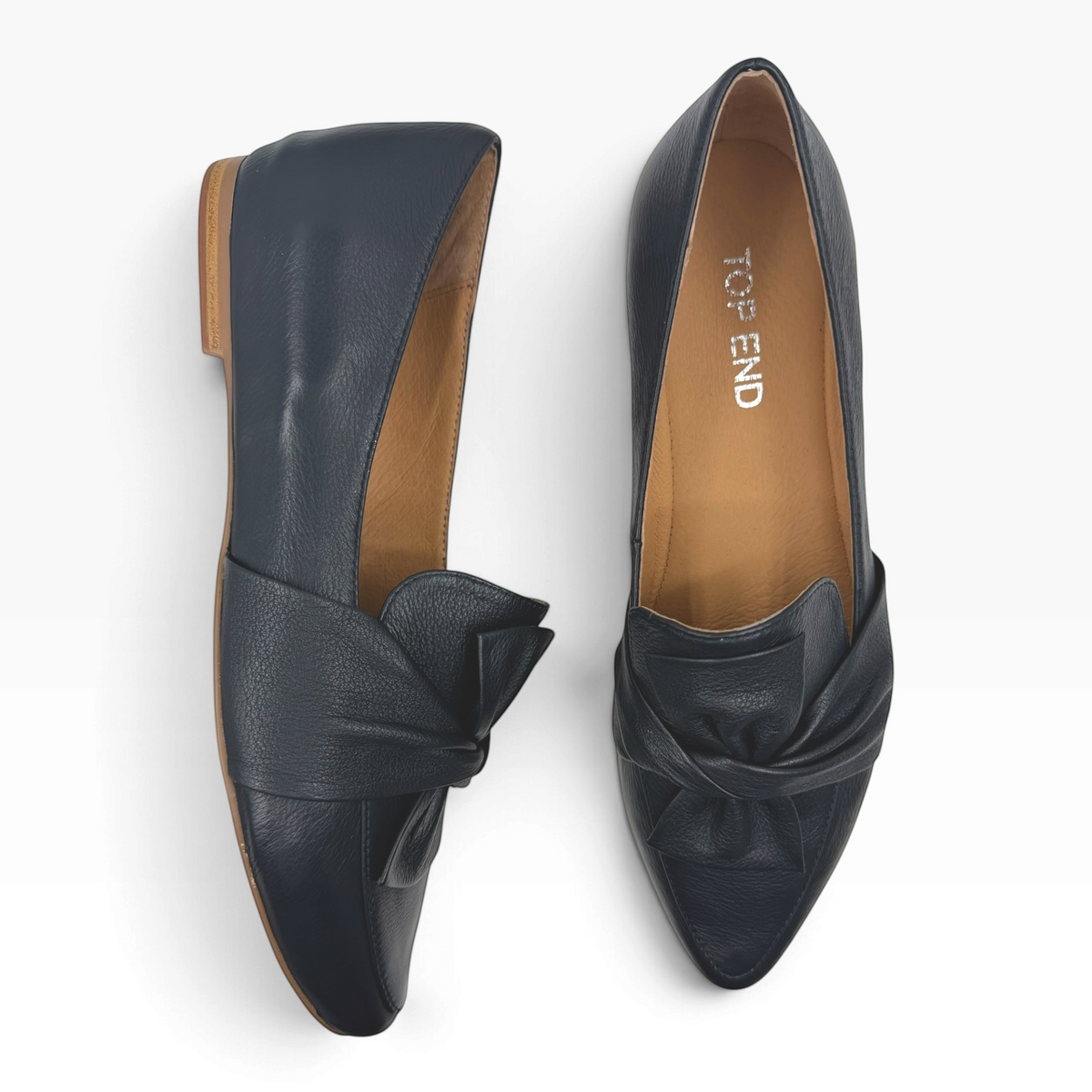 The Shoe Shop Sedone L navy leather pointed toe loafers with a decorative knot detail on the front