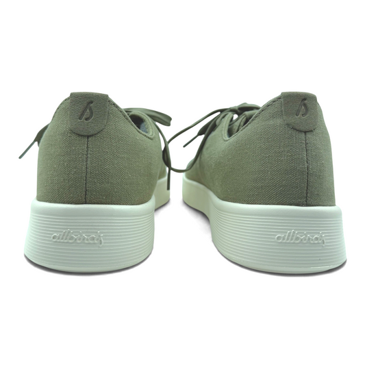 The Shoe Shop Cruiser canvas sneakers in olive green with a cushioned sugarcane midsole, rear view.