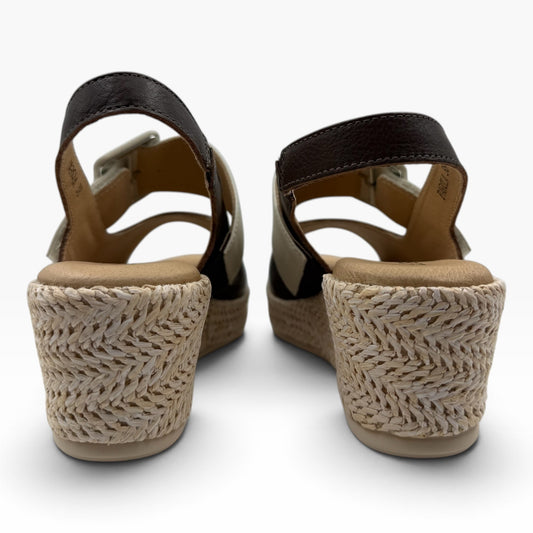 The Shoe Shop Parola two-tone leather wedge sandals with raffia-covered heels and adjustable straps, back view.