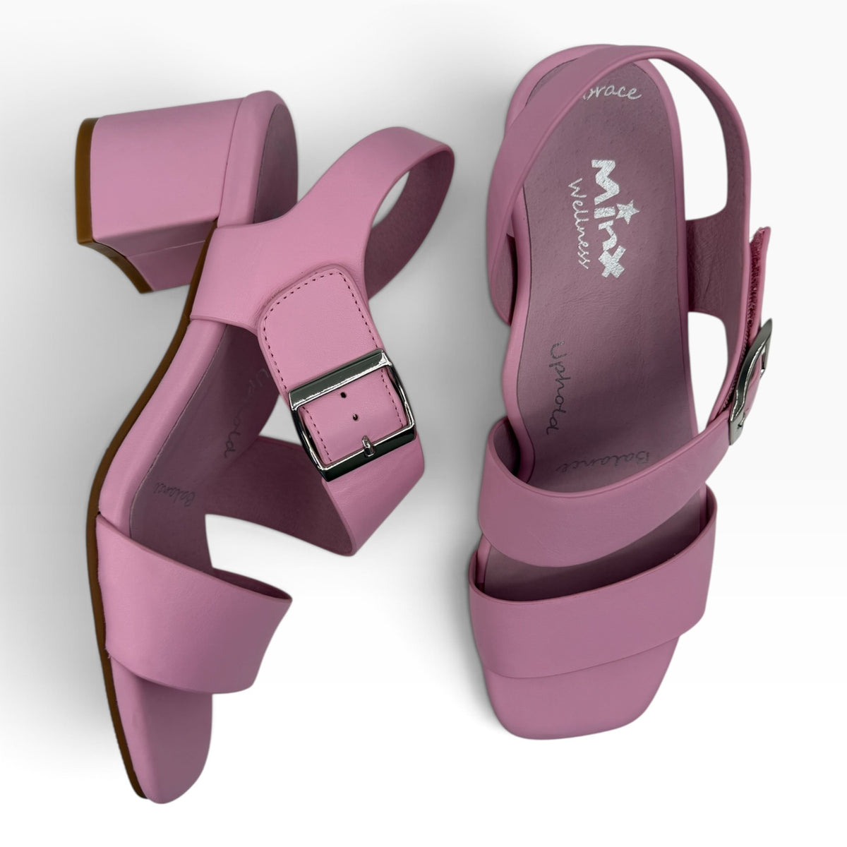 The Shoe Shop Vibe sandal in soft pink leather with a block heel, adjustable ankle strap, and silver buckle.