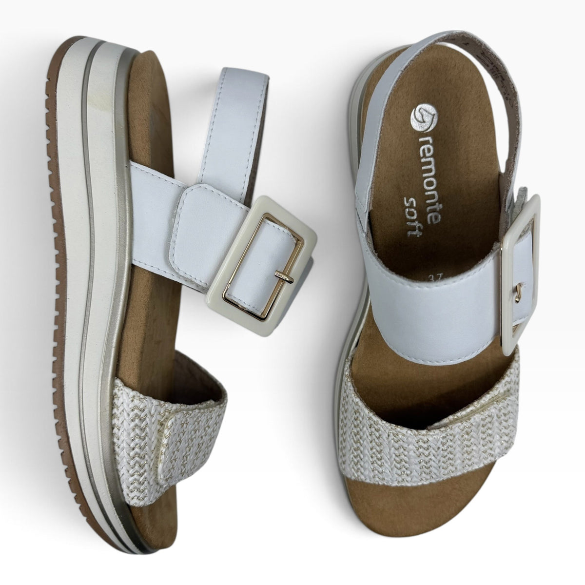 The Shoe Shop Remonte white platform sandals with a woven textured strap, adjustable buckle, and cushioned footbed.