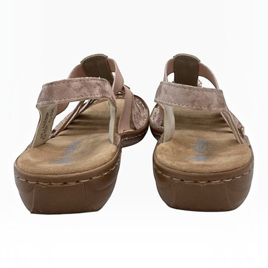 The Shoe Shop Rieker 60855-31 blush pink leather and textile sandals with cushioned footbeds and low wedge heels.