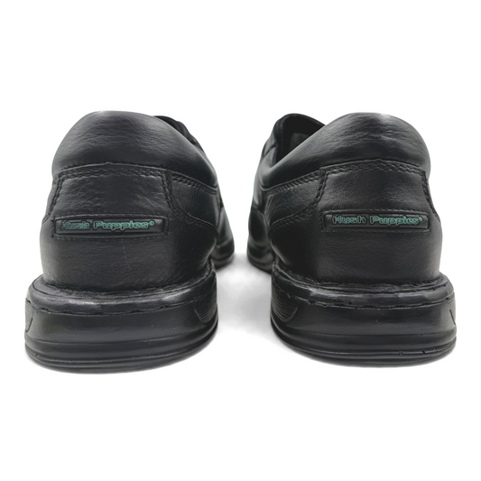 The Shoe Shop Roland black leather Hush Puppies shoes, rear view showing branded heel detail and durable soles