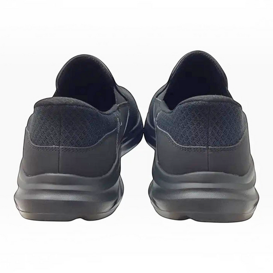 The Shoe Shop Skechers Equalizer 6.0 Stoaver black slip-on shoes, showing the heel and back view of the extra wide fit.