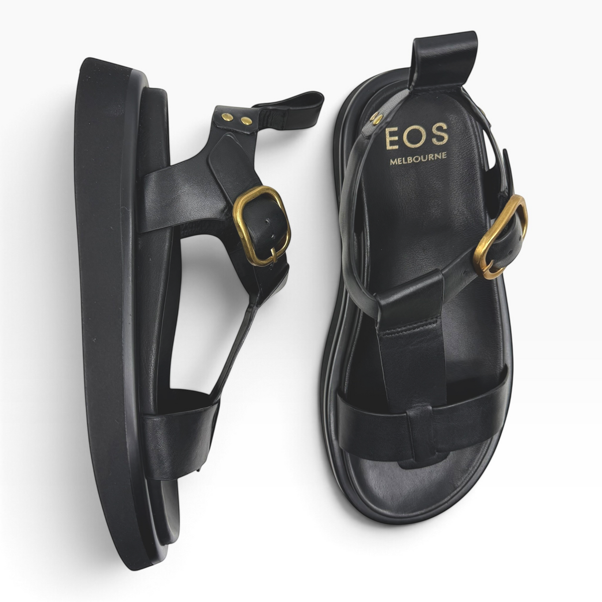 The Shoe Shop Slays black leather platform sandals with gold buckle detail and ankle strap
