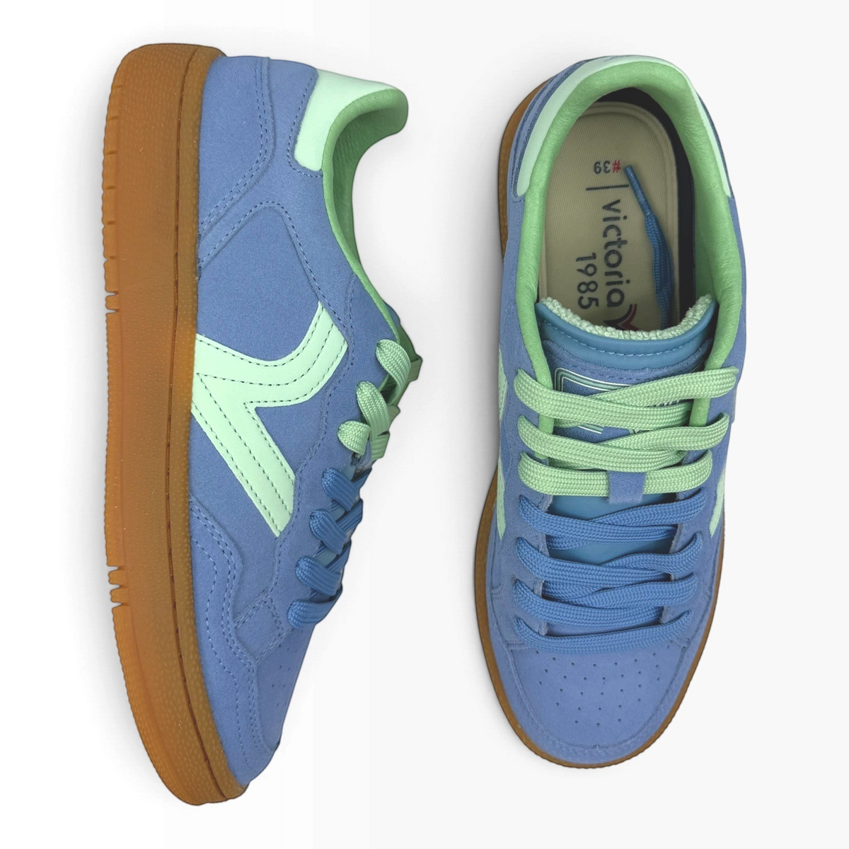 The Shoe Shop Smash Sneaker in celeste blue suede with mint green accents and a classic gum rubber sole.