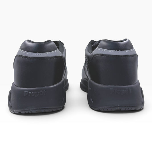 The Shoe Shop Stability X Strap 5E black orthopaedic sneakers viewed from the back with cushioned heels