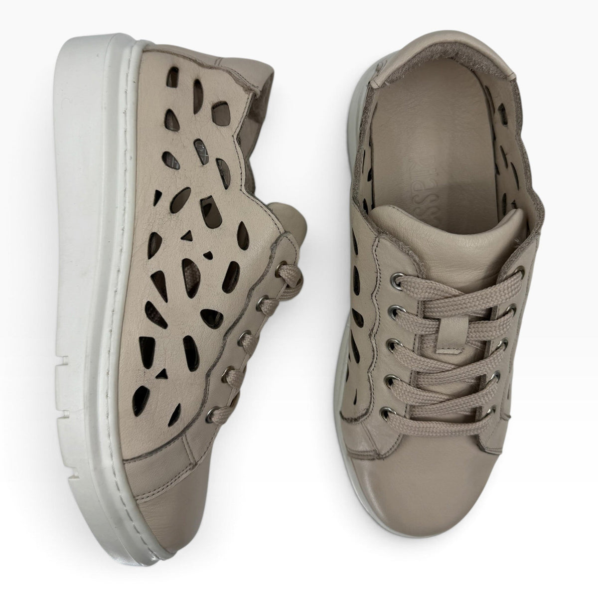 The Shoe Shop Tira faux leather sneakers in beige with laser-cut perforated panels and a white platform sole.