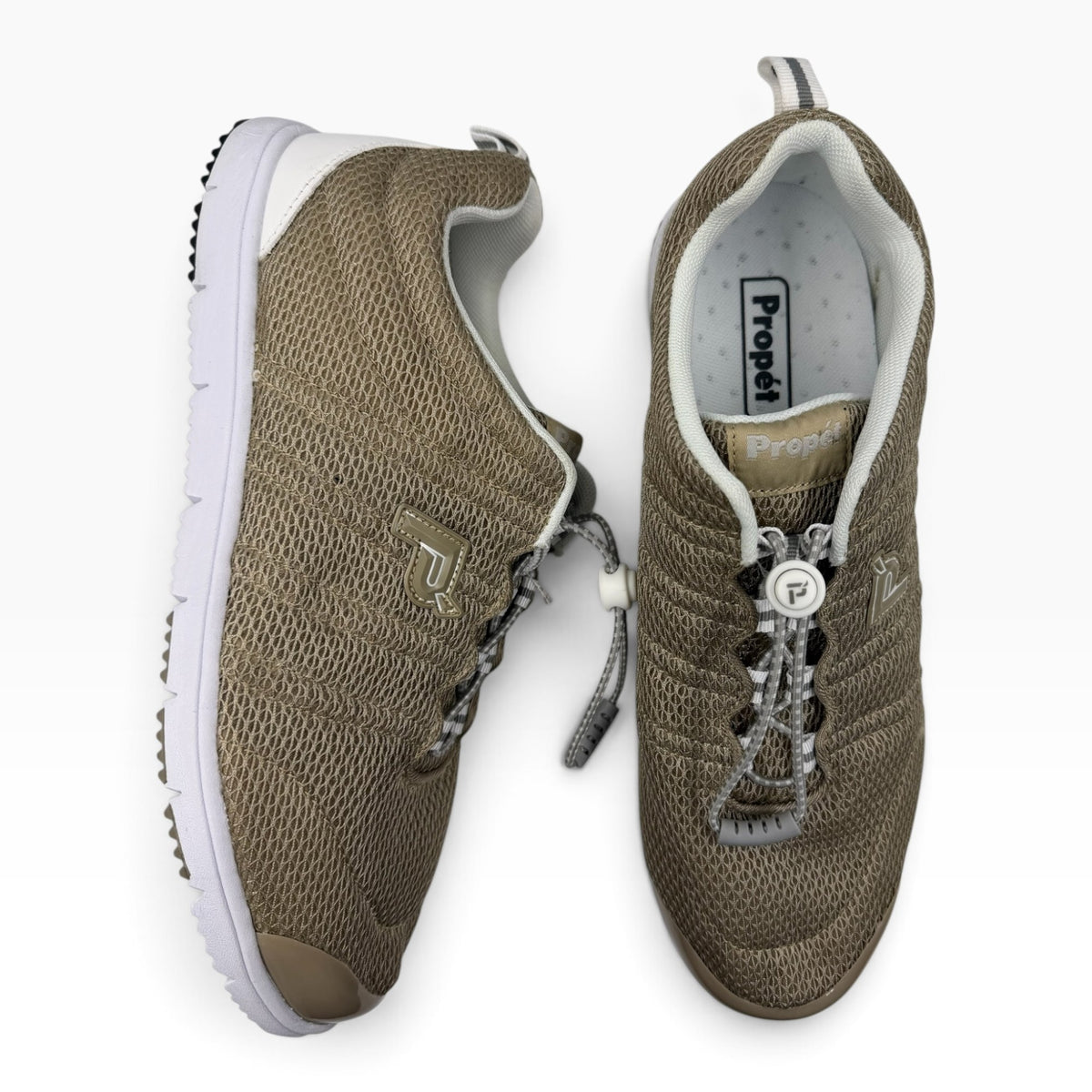 The Shoe Shop Travel Walker 2E beige mesh sneakers with white soles and convenient toggle lacing system