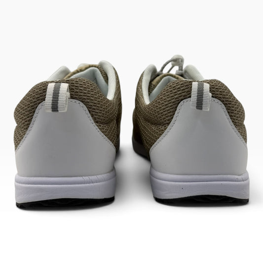 Rear view of The Shoe Shop Travel Walker 2E sneakers in beige mesh with white heel panels and pull tabs.