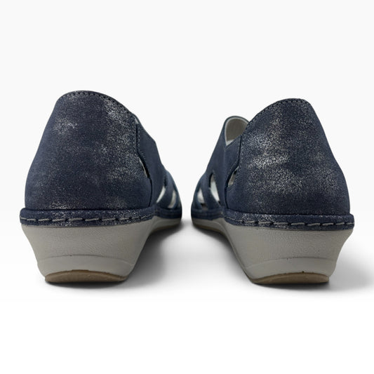The Shoe Shop Vivi wedge sandal in navy blue with a shimmering finish and grey wedge heel, back view.