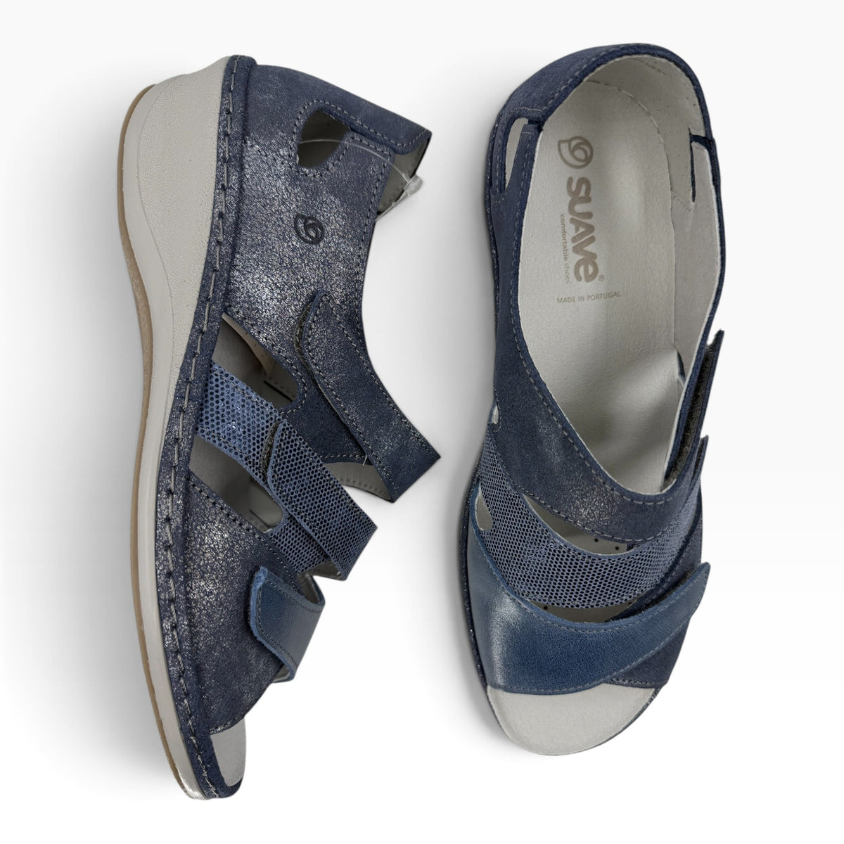 The Shoe Shop Vivi wedge sandals in navy blue with metallic finish, featuring adjustable straps and cushioned soles.