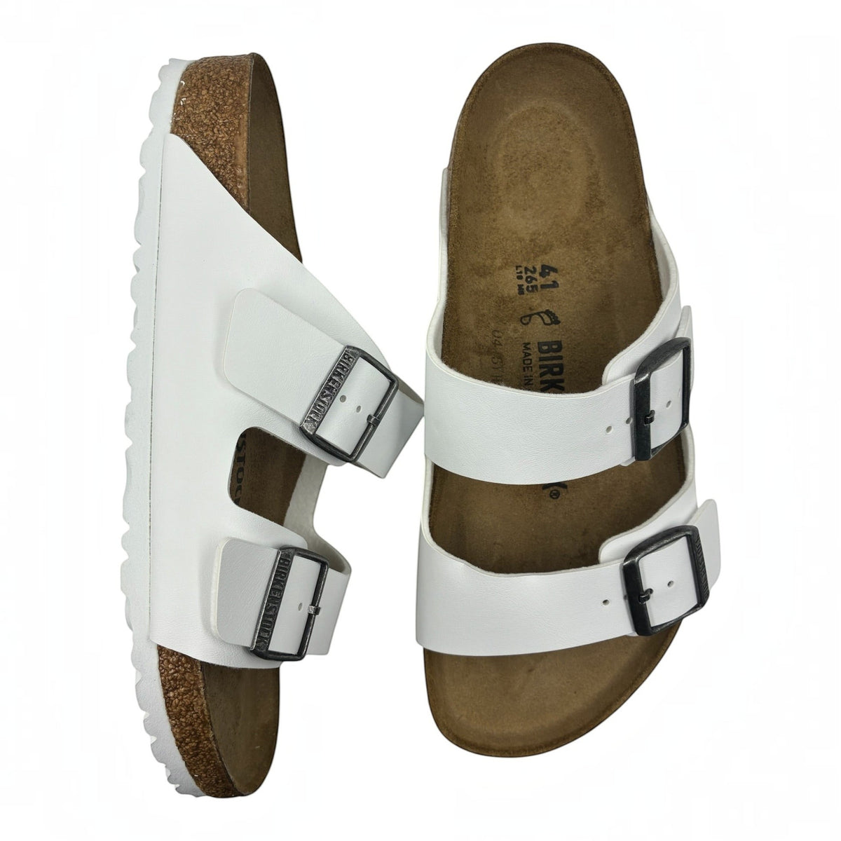 The Shoe Shop Arizona Birko-Flor white two-strap sandals with cork-latex footbed and adjustable metal buckles