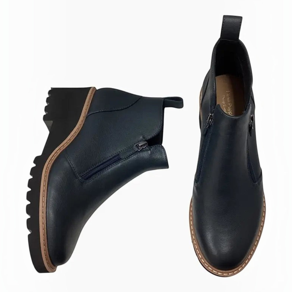 The Shoe Shop Whitney black leather ankle boots featuring twin side zips and a comfortable 60mm wedge heel.