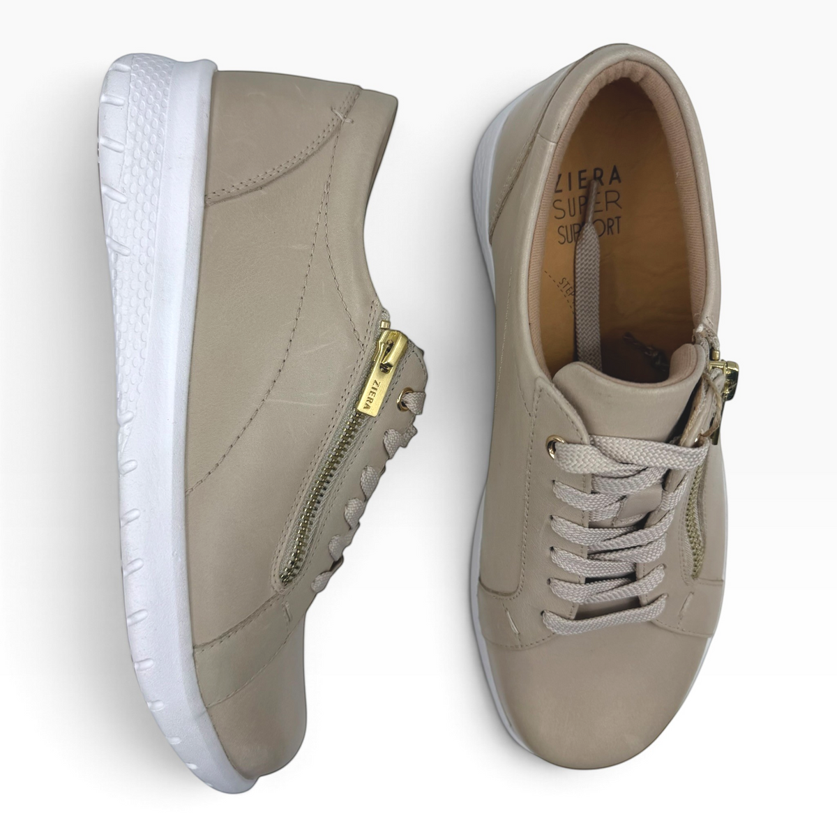 The Shoe Shop Ziera Solar XF beige leather sneakers with side zip, lace-up closure, and white slip-resistant sole.