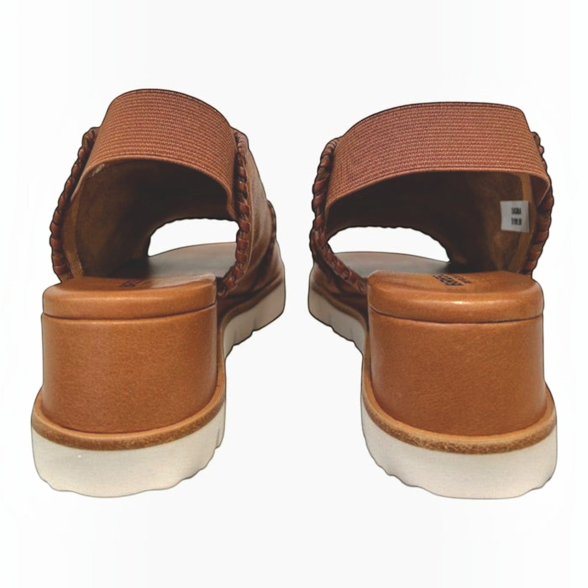 The Shoe Shop Sigma tan leather wedge sandals featuring contrast whipstitching and an elasticated slingback strap.
