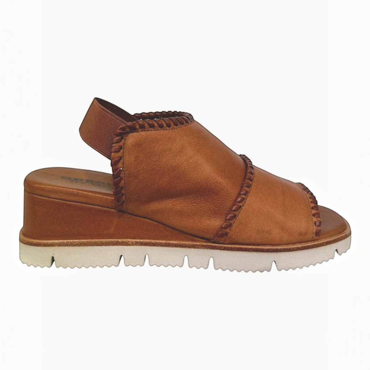The Shoe Shop Sigma tan leather wedge sandal with contrast whipstitch detailing and an elasticated slingback strap.