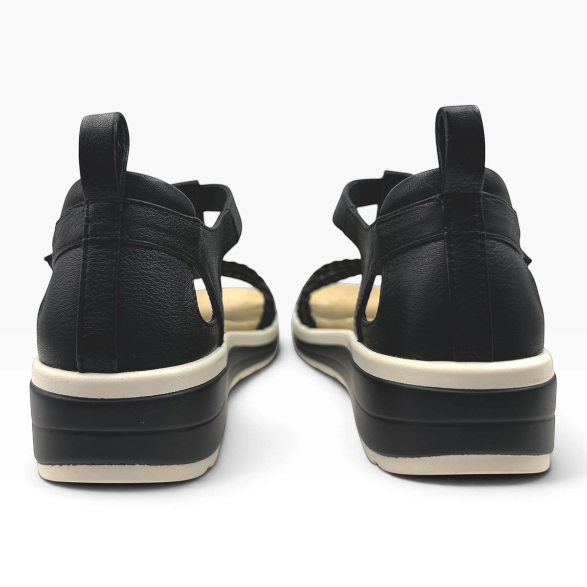 The Shoe Shop Havana black braided leather sandals featuring a modern flatform rubber sole and cushioned footbed