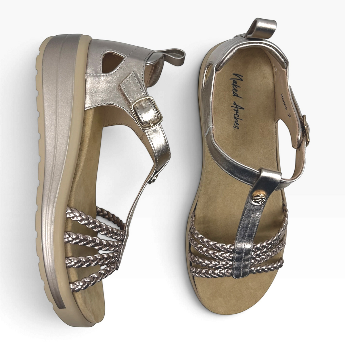 The Shoe Shop Havana metallic silver braided leather flatform sandals with adjustable buckle and cushioned footbed.