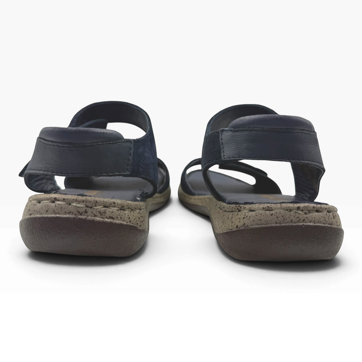 The Shoe Shop Meteor Sandal in navy leather and suede with adjustable straps and a cushioned textured sole, back view