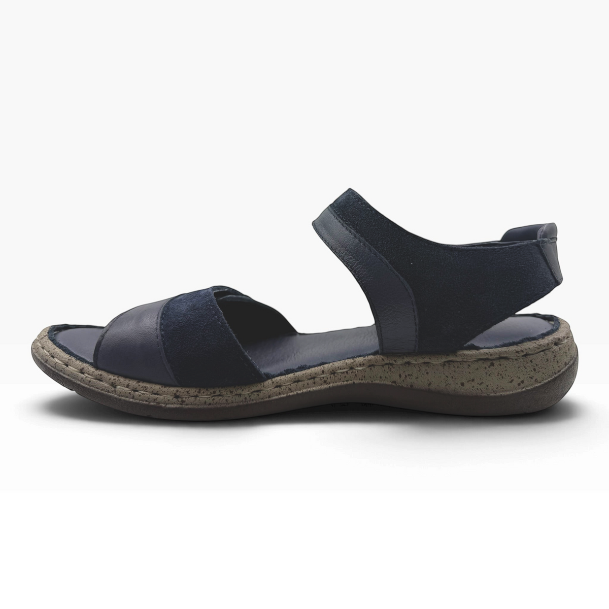The Shoe Shop Meteor Sandal in navy blue leather and suede with adjustable straps and a cushioned, textured sole.