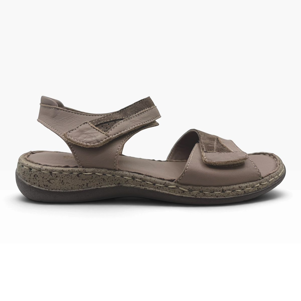The Shoe Shop Meteor Sandal in taupe leather and suede with adjustable Velcro straps and a cushioned speckled sole.