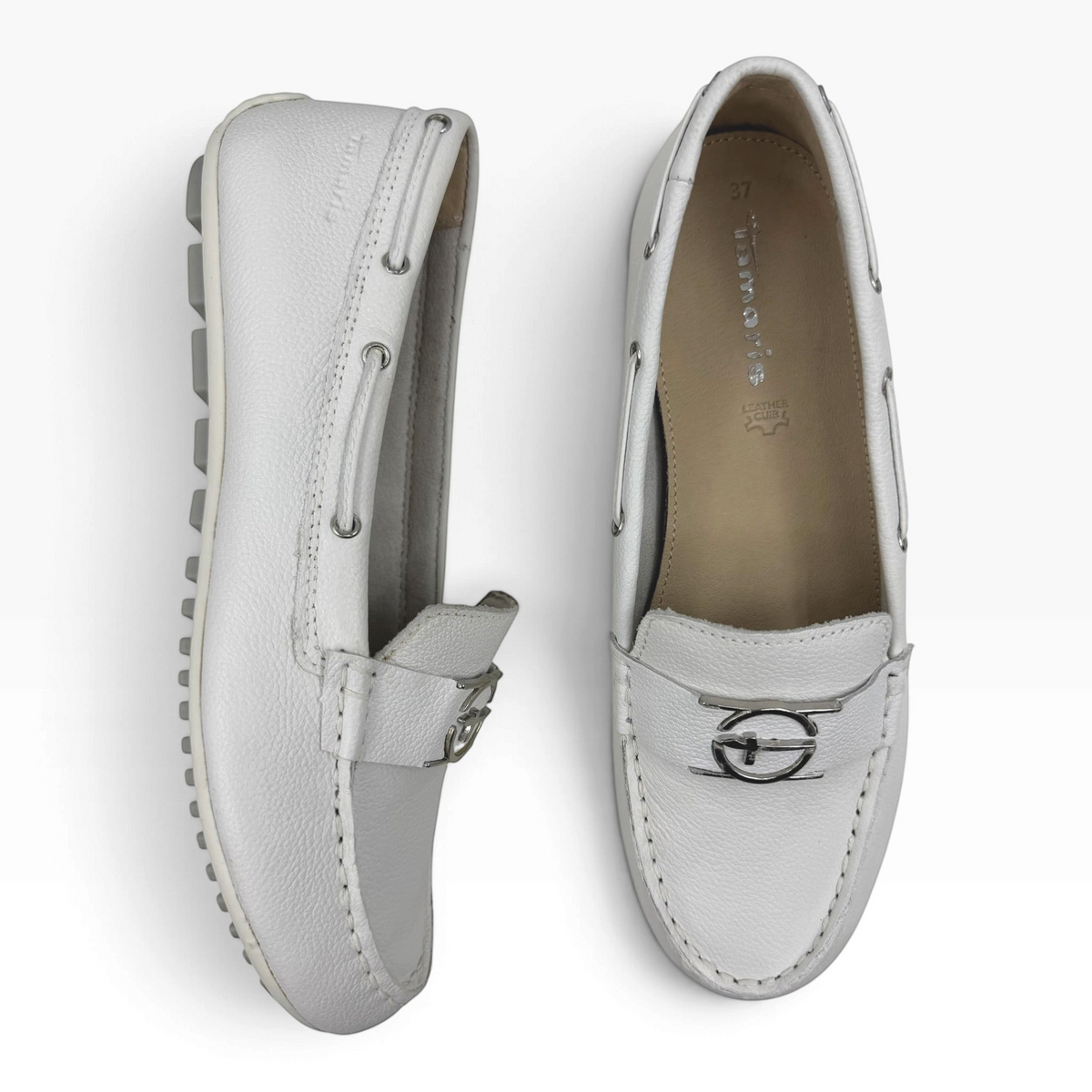 The Shoe Shop 24630 white leather loafers with gold-tone hardware and flexible rubber driving soles