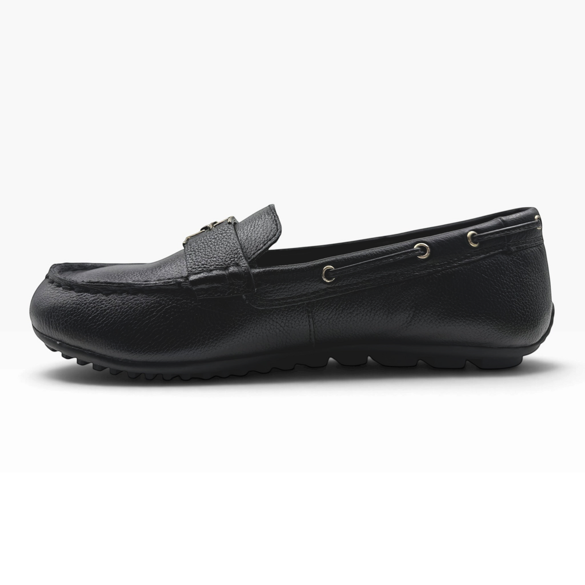 The Shoe Shop 24630 black leather loafer with gold-tone hardware and flexible driving sole, side view