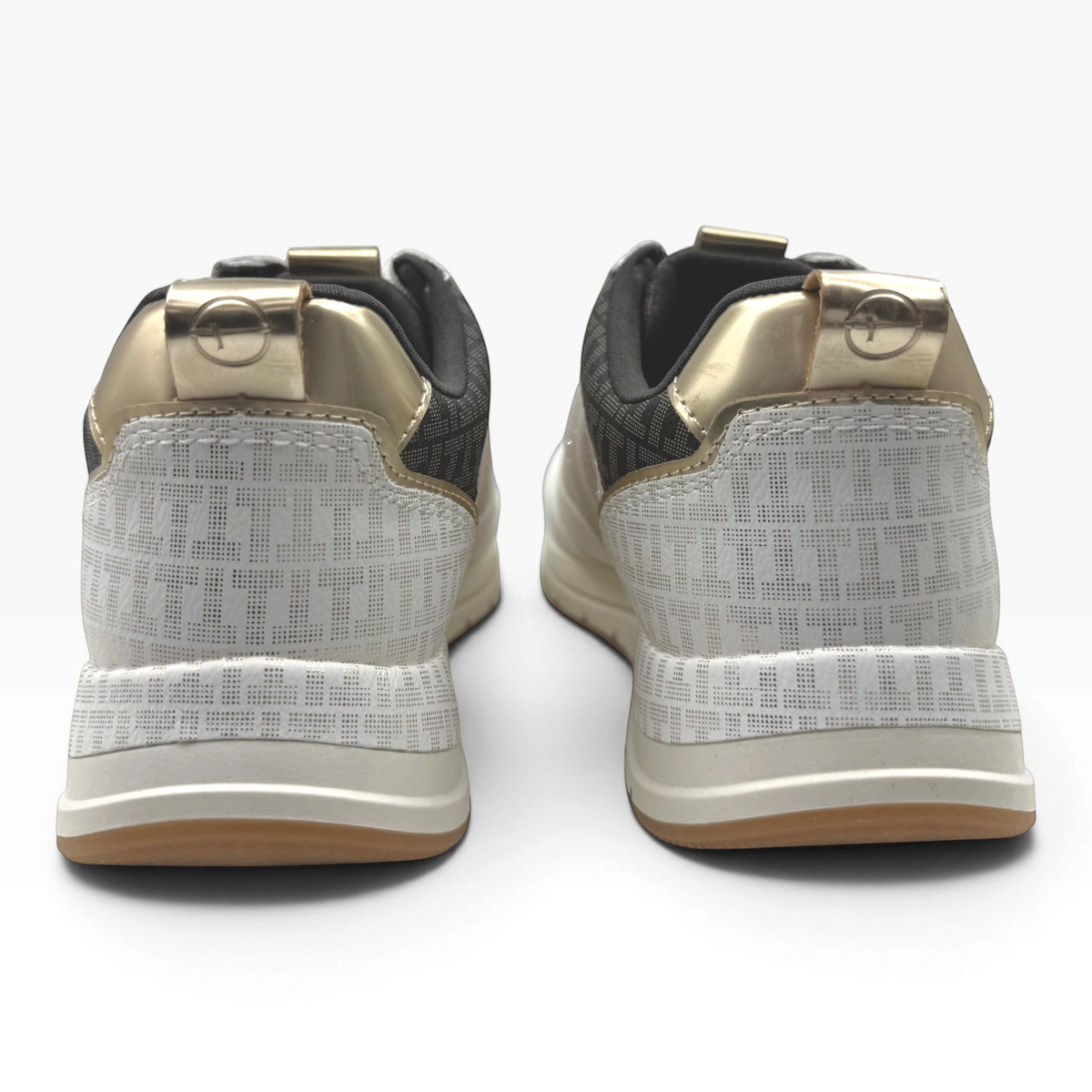 The Shoe Shop 23732 sneakers showing the back view with white patterned leather, gold metallic accents, and gum soles.